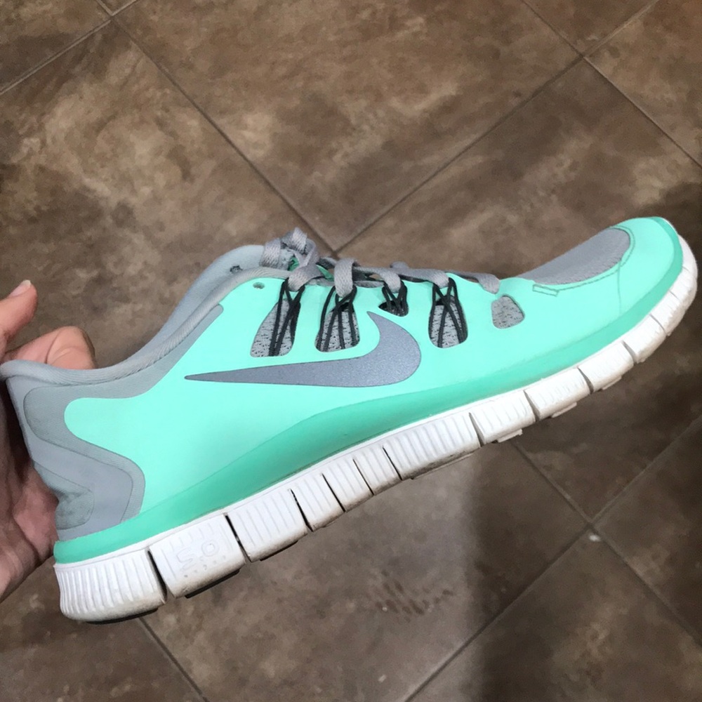 Mint and grey Nike tennis shoes
